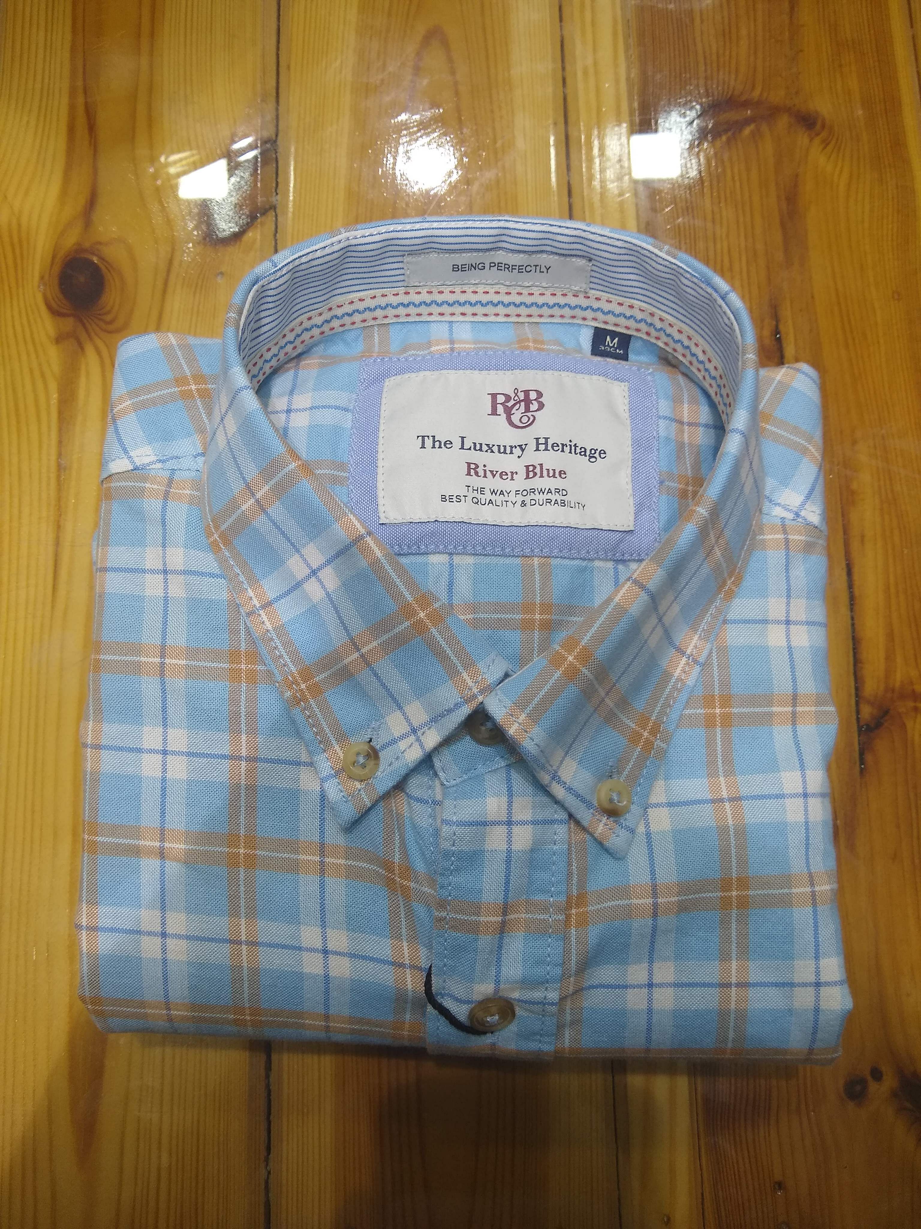 Clothing,Plaid,Dress shirt,Shirt,Pattern,Design,Collar,Button,Textile,Fashion accessory