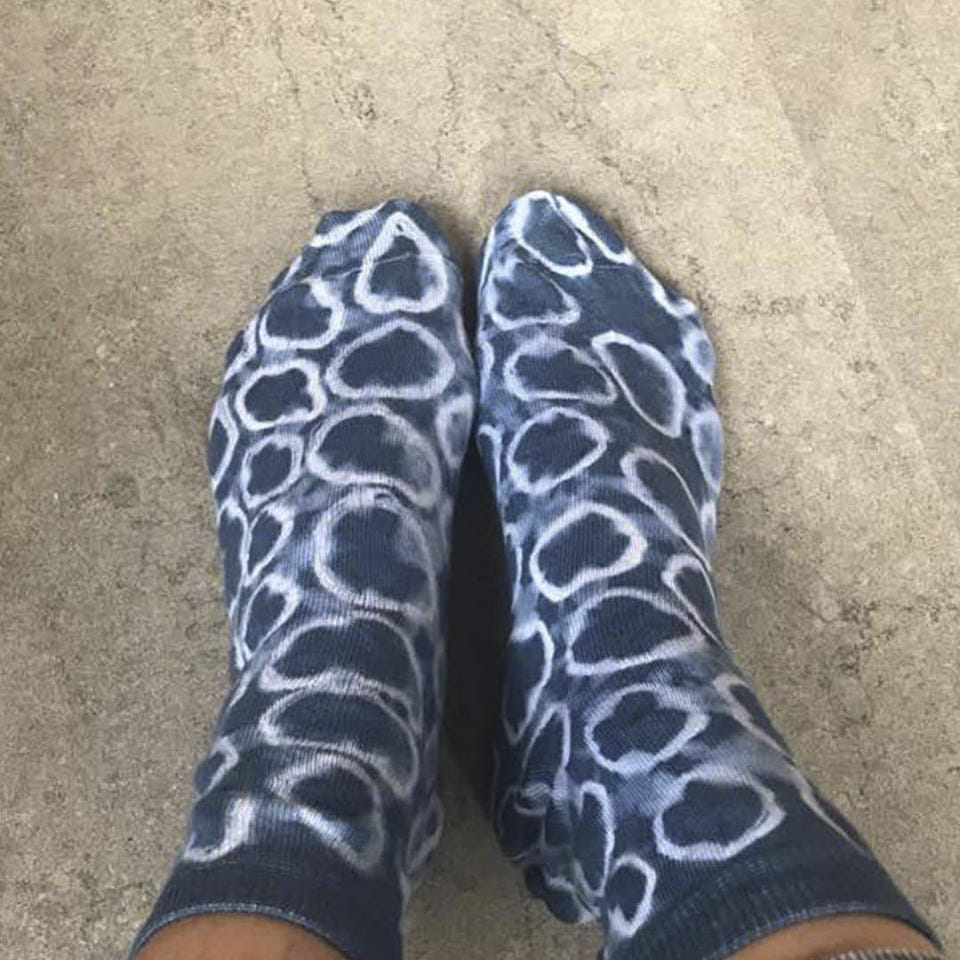 Footwear,Blue,Sock,Shoe,Human leg,Leg,Ankle,Joint,Fashion accessory,Material property