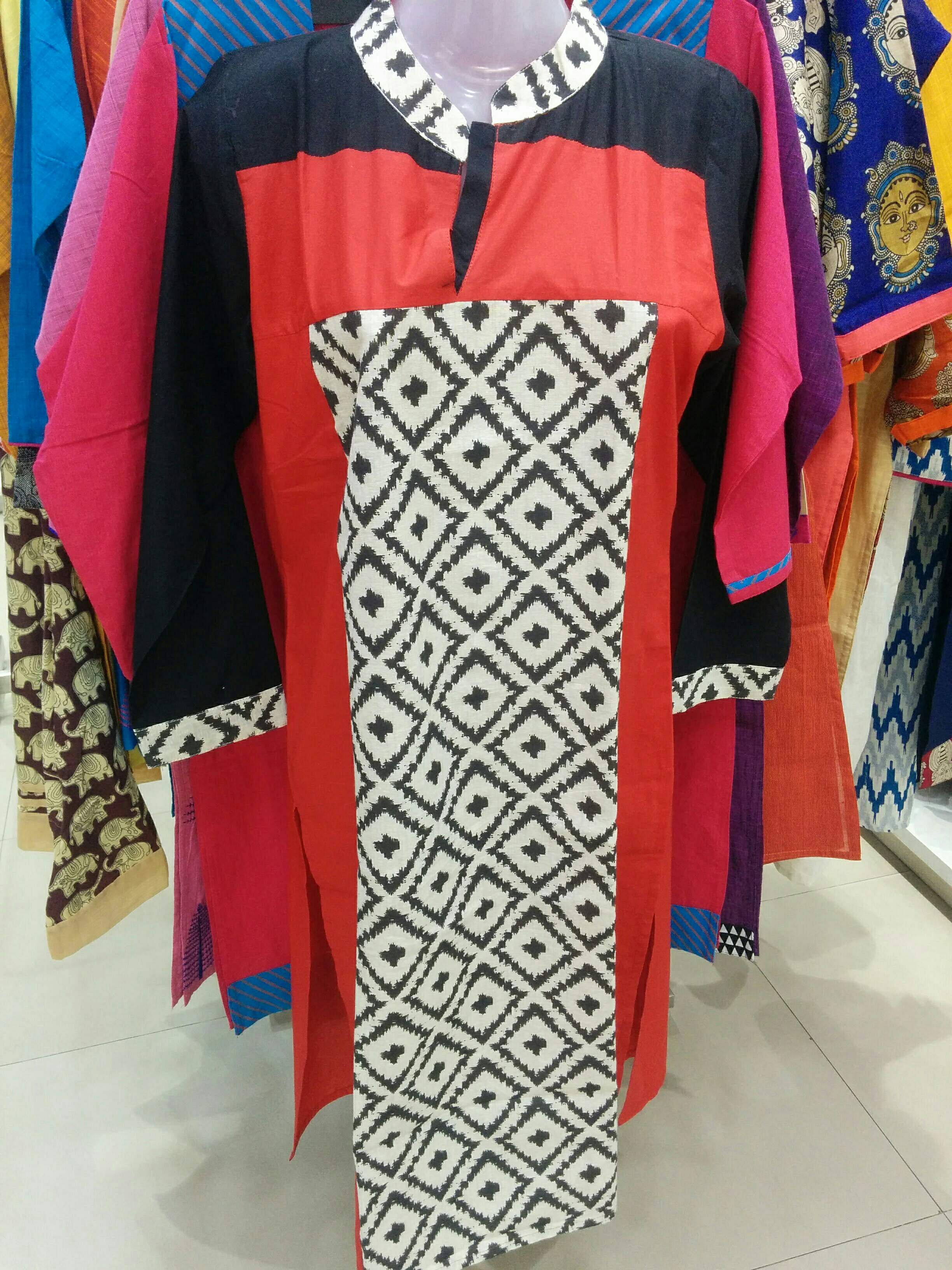 Clothing,Day dress,T-shirt,Sleeve,Boutique,Dress,Textile,Fashion design,Pattern