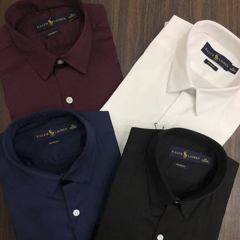 Dress shirt,Collar,Shirt,Clothing,Sleeve,Button,Brand,Formal wear,Fashion accessory,T-shirt