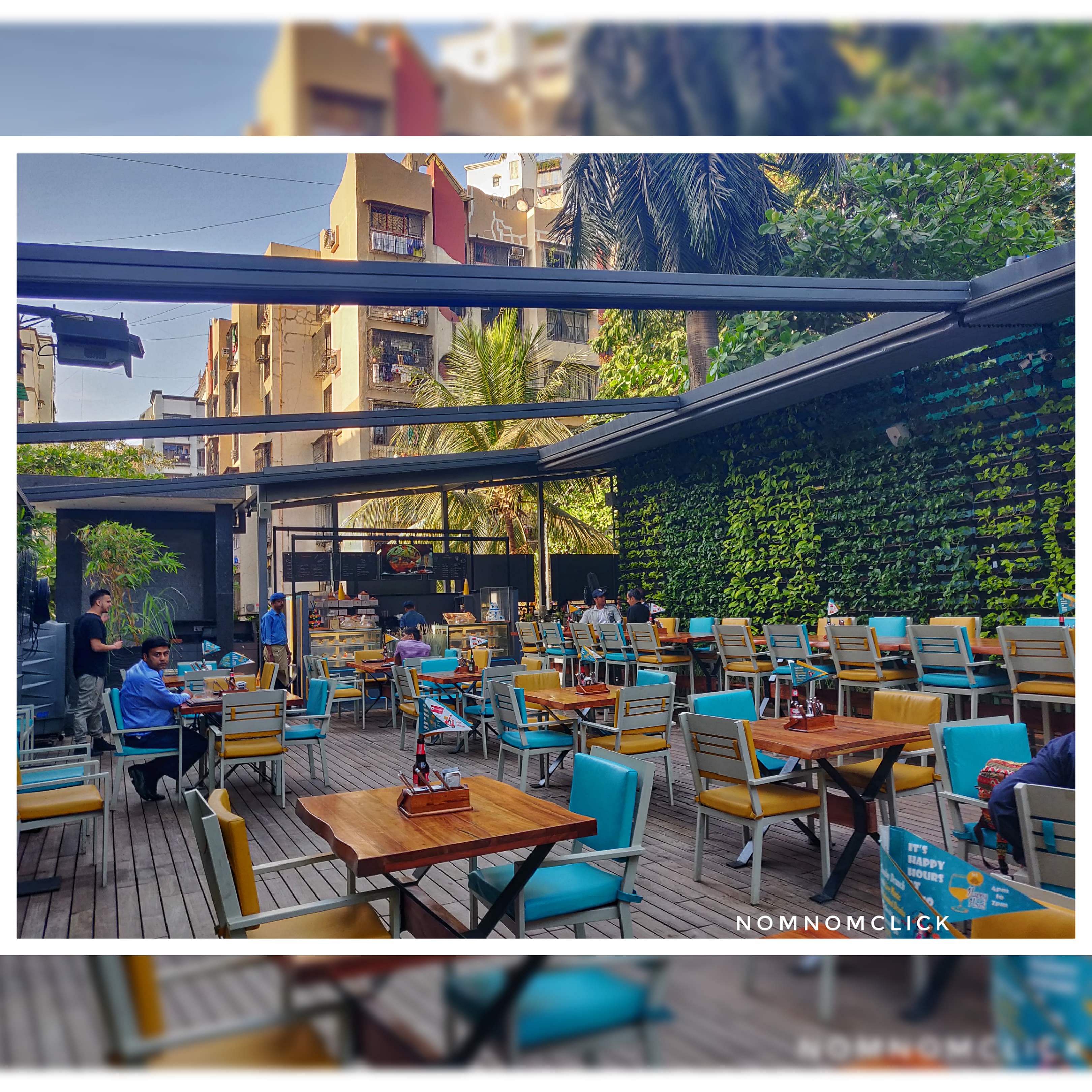 Sky,Table,Building,Home,Restaurant,Furniture,House,Chair,Plant,Patio