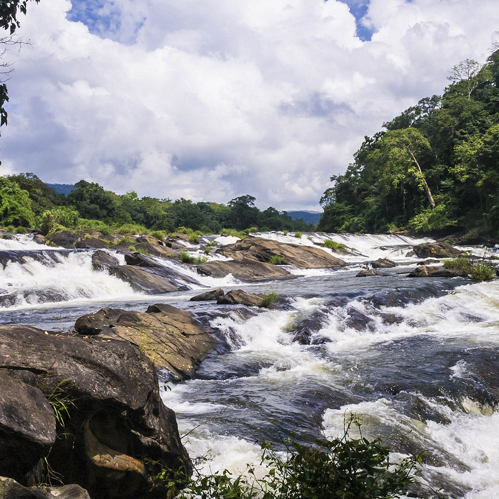 Water resources,Body of water,Rapid,Water,River,Nature,Watercourse,Natural landscape,Sky,Waterfall