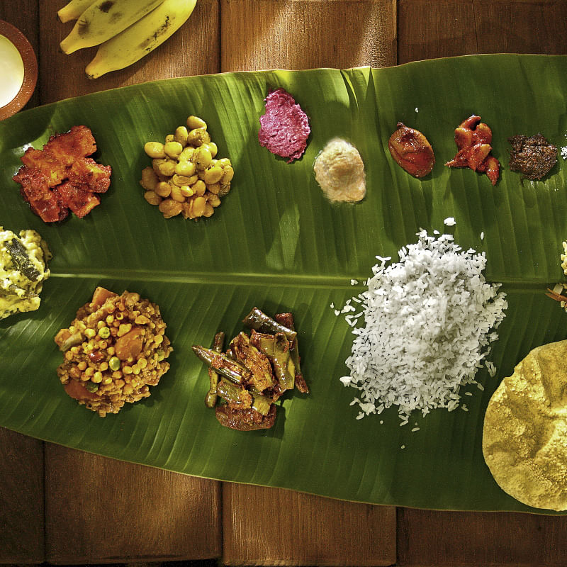 Sadya,Banana leaf,Banana leaf rice,Leaf,Food,Dish,Suman,Cuisine,Andhra food,Vegetarian food