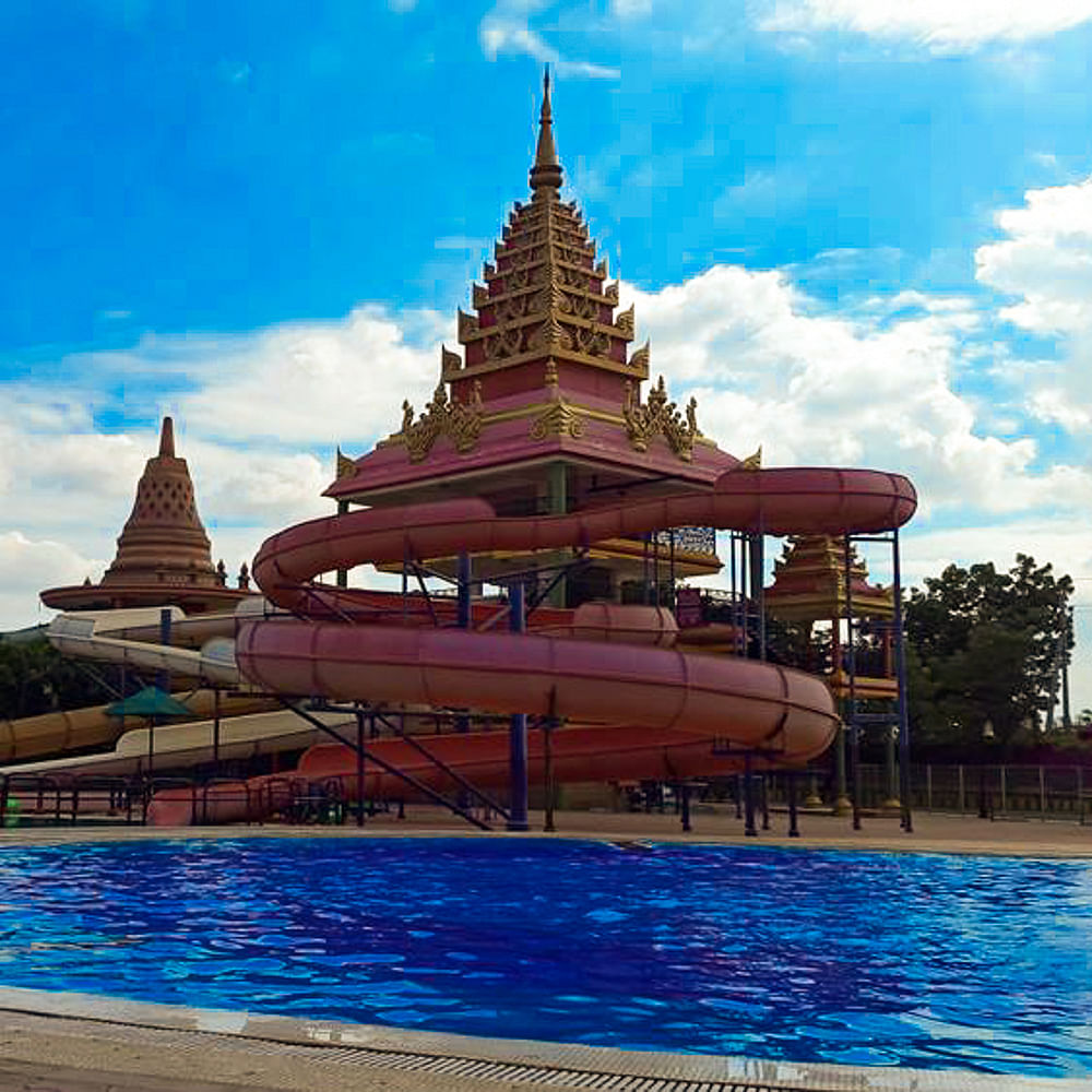 Landmark,Sky,Temple,Architecture,Place of worship,Building,Leisure,Swimming pool,Pagoda,Vacation