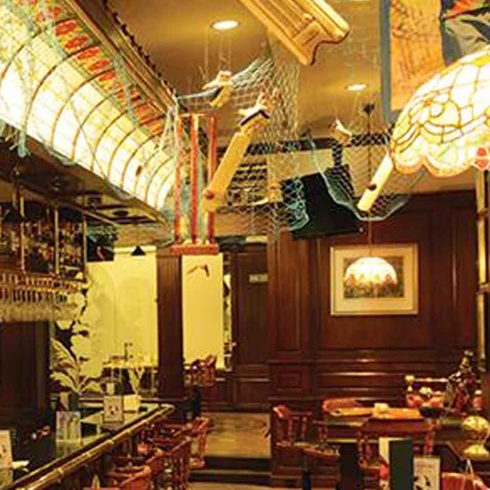 Ceiling,Building,Lighting,Interior design,Restaurant,Tavern,Room,Architecture,Bar,Beam