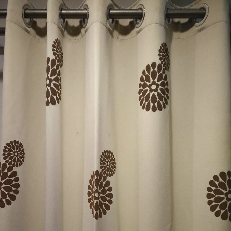 Curtain,Brown,Textile,Interior design,Window treatment,Shower curtain,Room,Pattern,Interior design