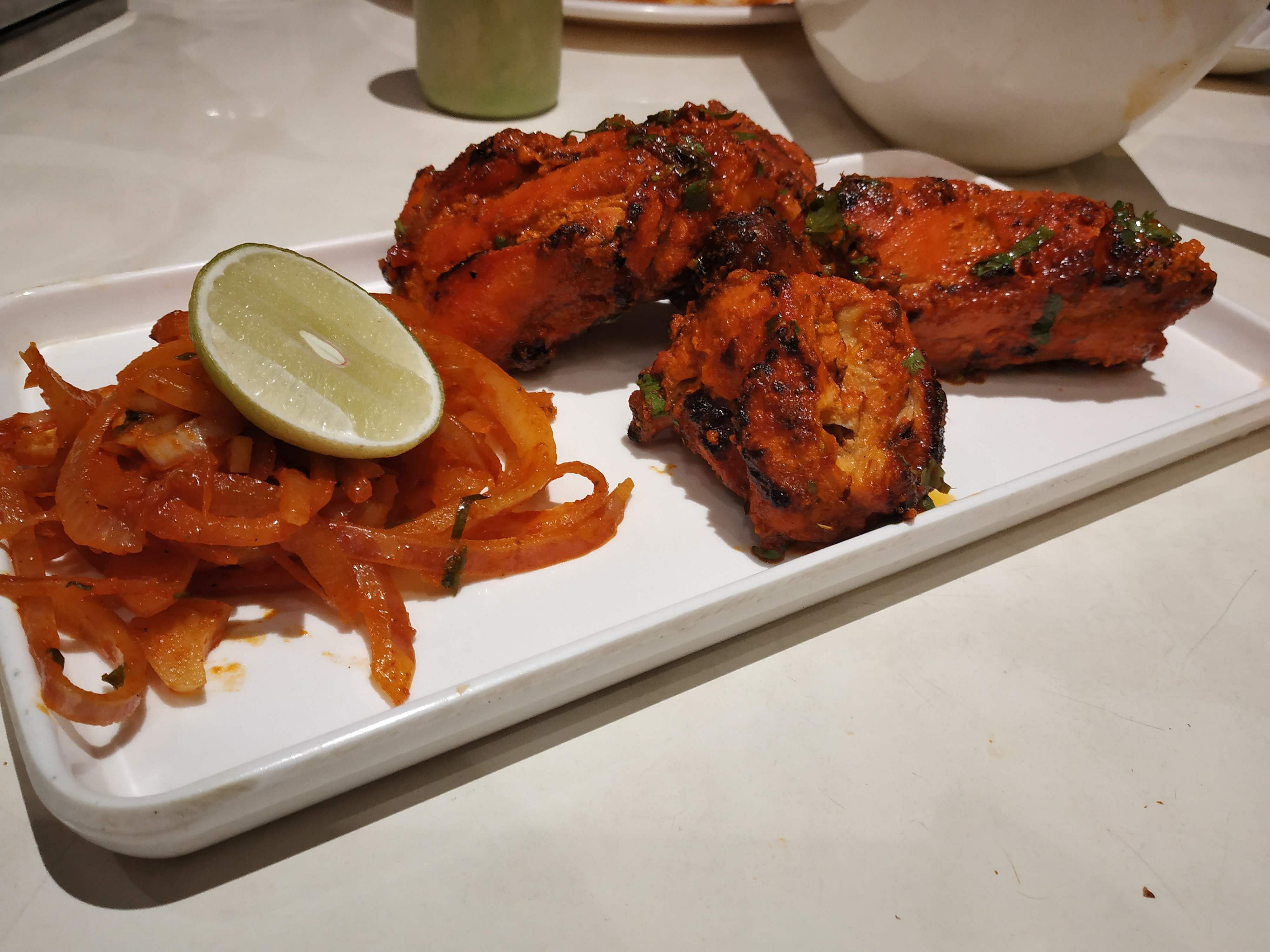 Dish,Cuisine,Food,Fried food,Tandoori chicken,Ingredient,Chicken tikka,Chicken meat,Meat,Tandoori masala