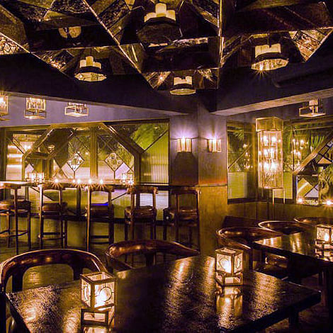 Lighting,Building,Interior design,Restaurant,Room,Architecture,Ceiling,Tree,Night,Bar