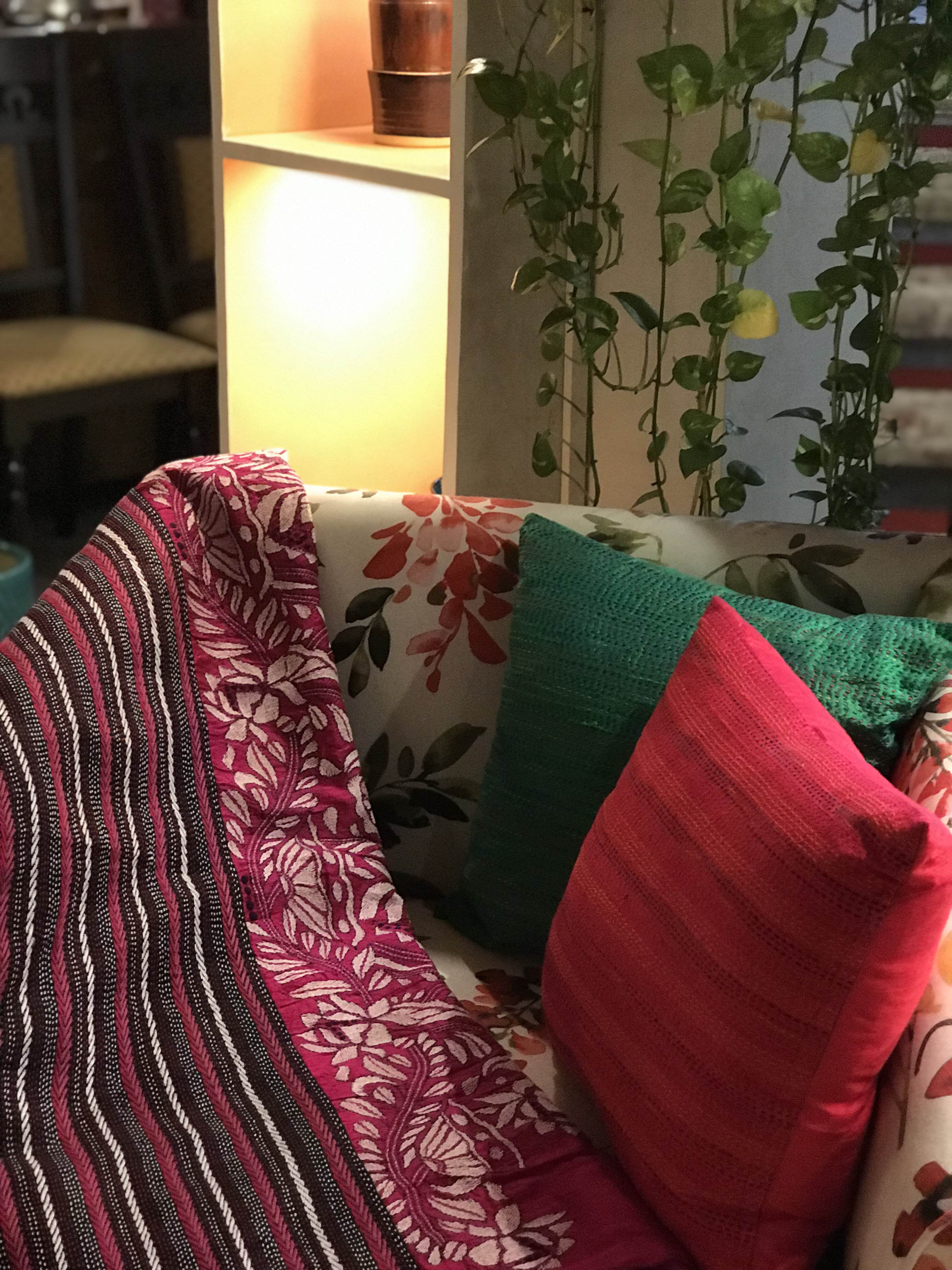 Furniture,Room,Couch,Pink,Property,Living room,Textile,Magenta,Interior design,Cushion