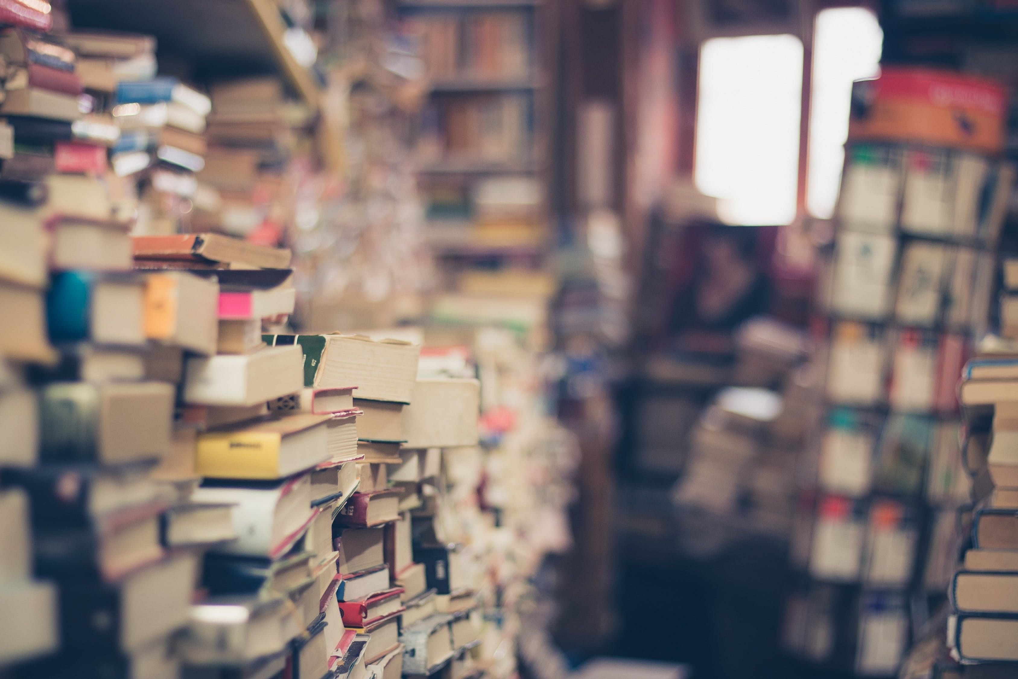 Bookselling,Beauty,Text,Snapshot,Sky,Urban area,Building,Retail,Book,Publication