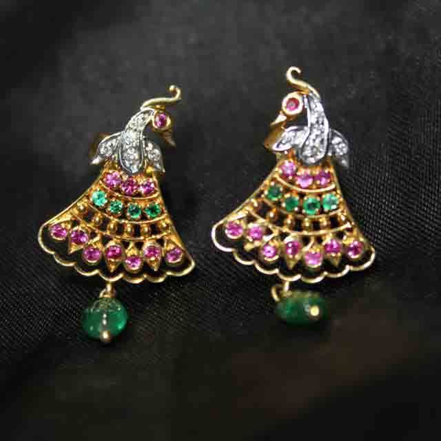 Earrings,Jewellery,Fashion accessory,Emerald,Diamond,Body jewelry,Magenta,Gemstone,Ornament,Jewelry making