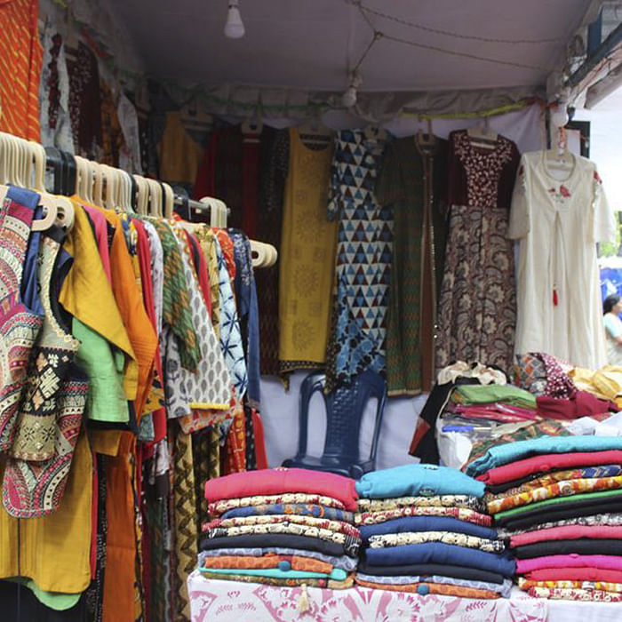 Clothing,Boutique,Bazaar,Room,Public space,Human settlement,Market,Textile,Closet,Selling