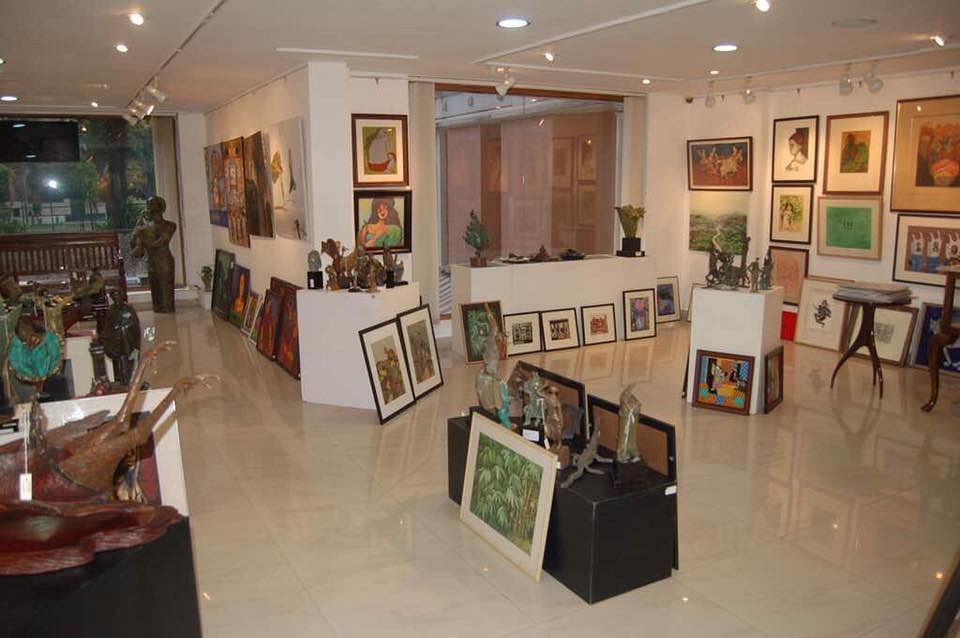 Art gallery,Building,Art exhibition,Exhibition,Museum,Tourist attraction,Interior design,Art,Room,Event