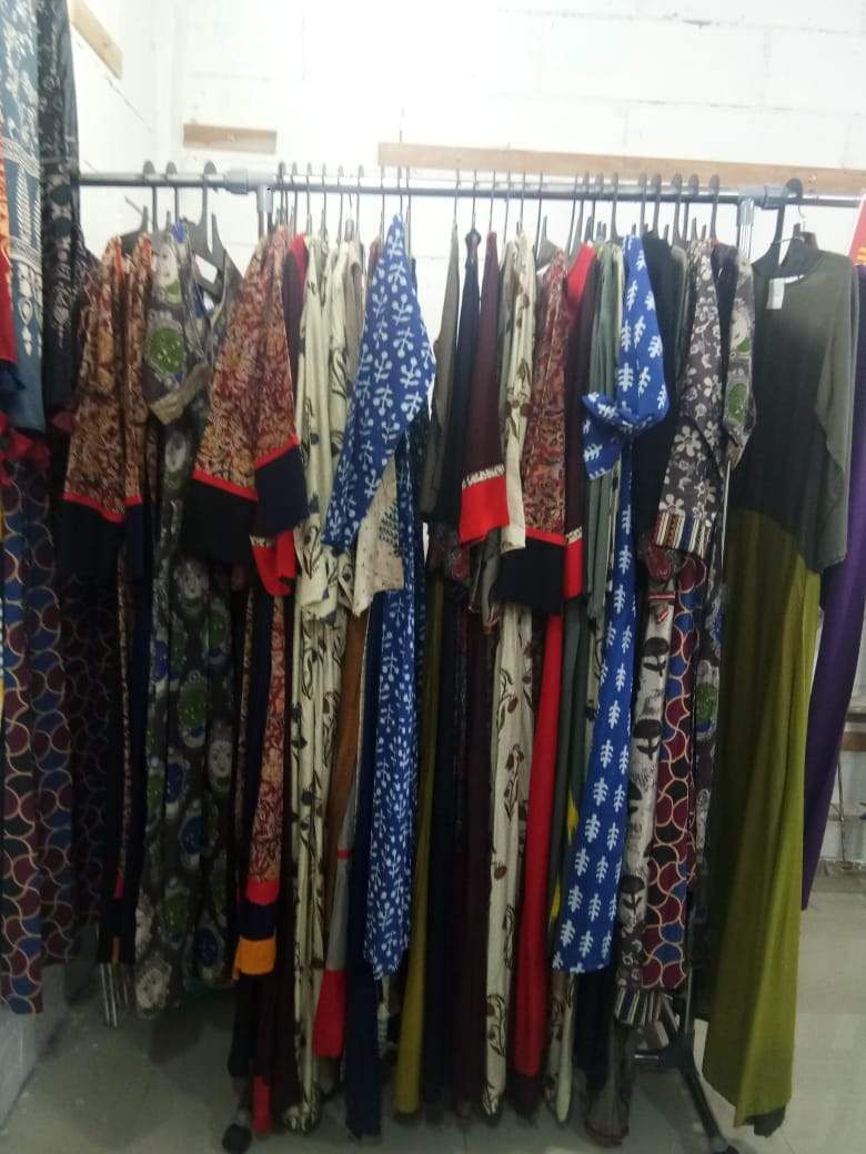 Boutique,Clothing,Bazaar,Room,Human settlement,Public space,Textile,Outerwear,Closet,Wardrobe