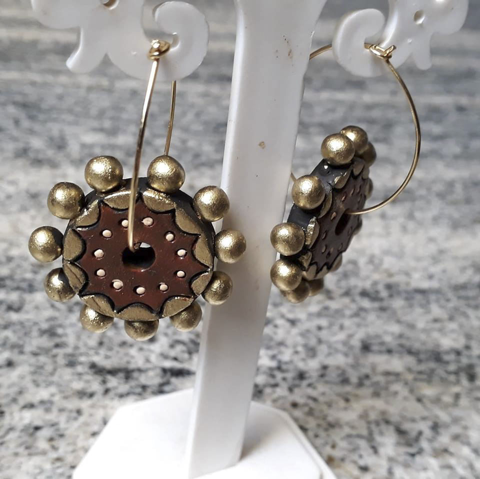 Earrings,Jewellery,Fashion accessory,Pearl,Body jewelry,Gemstone,Metal