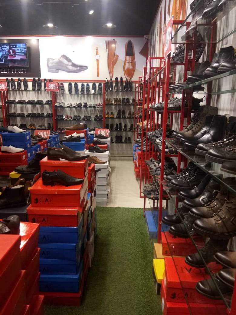 Aisle,Footwear,Building,Inventory,Warehouse,Retail,Shoe,Bookselling,Athletic shoe