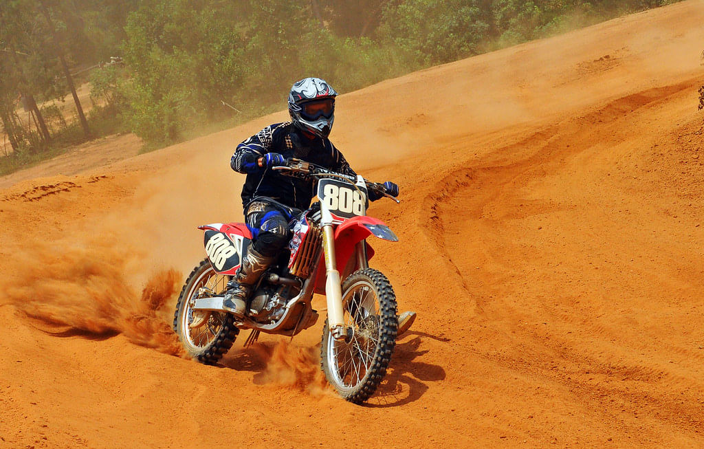 Land vehicle,Vehicle,Motorcycle,Motorcycling,Motocross,Desert racing,Off-road racing,Off-roading,Extreme sport,Freestyle motocross