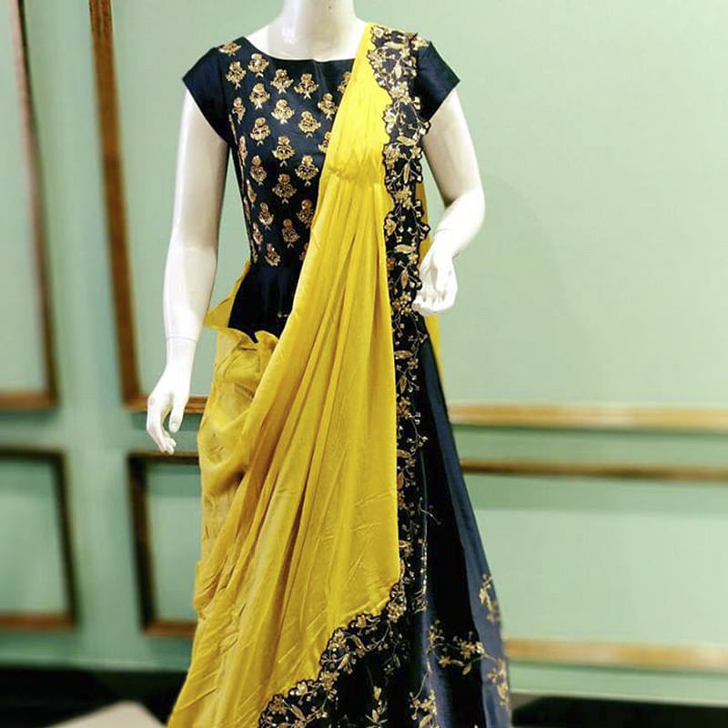 Clothing,Yellow,Formal wear,Dress,Sari,Fashion design,Textile,Fashion model,Embroidery