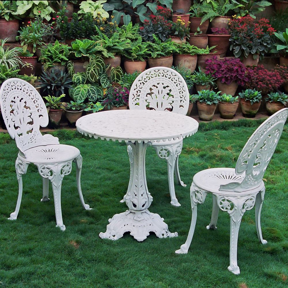 Furniture,Chair,Table,Outdoor table,Outdoor furniture,Iron,Grass family,Yard,Garden,Plant