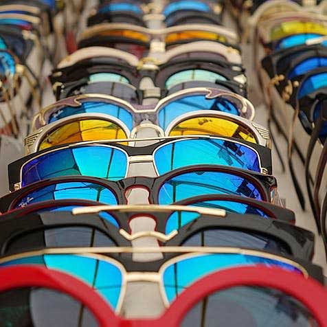 Eyewear,Glasses,Sunglasses,Vision care,Personal protective equipment,Architecture,Glass,Stained glass,Window,Symmetry