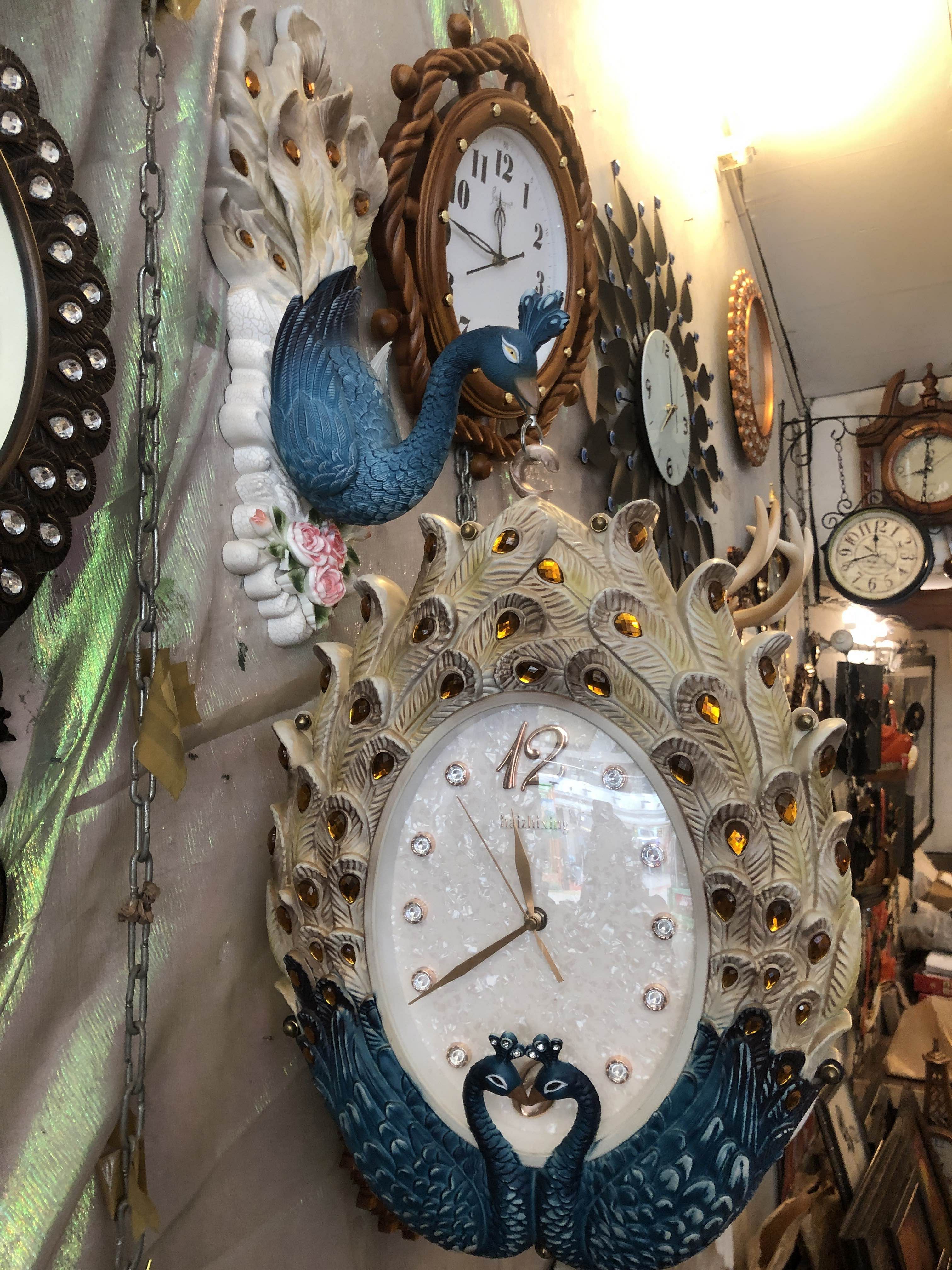Clock,Wall clock,Home accessories,Room,Fashion accessory,Interior design,Antique,Furniture,Interior design,Metal