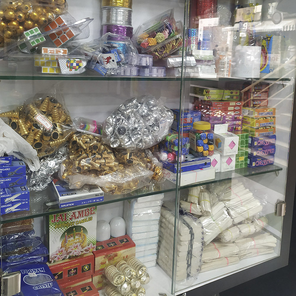 Snack,Convenience food,Plastic,Display case,Confectionery,Supermarket,Food,Toy,Convenience store,Grocery store