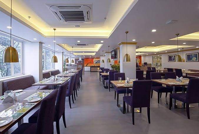 Restaurant,Building,Room,Interior design,Cafeteria,Dining room,Business,Ceiling,Café,Table