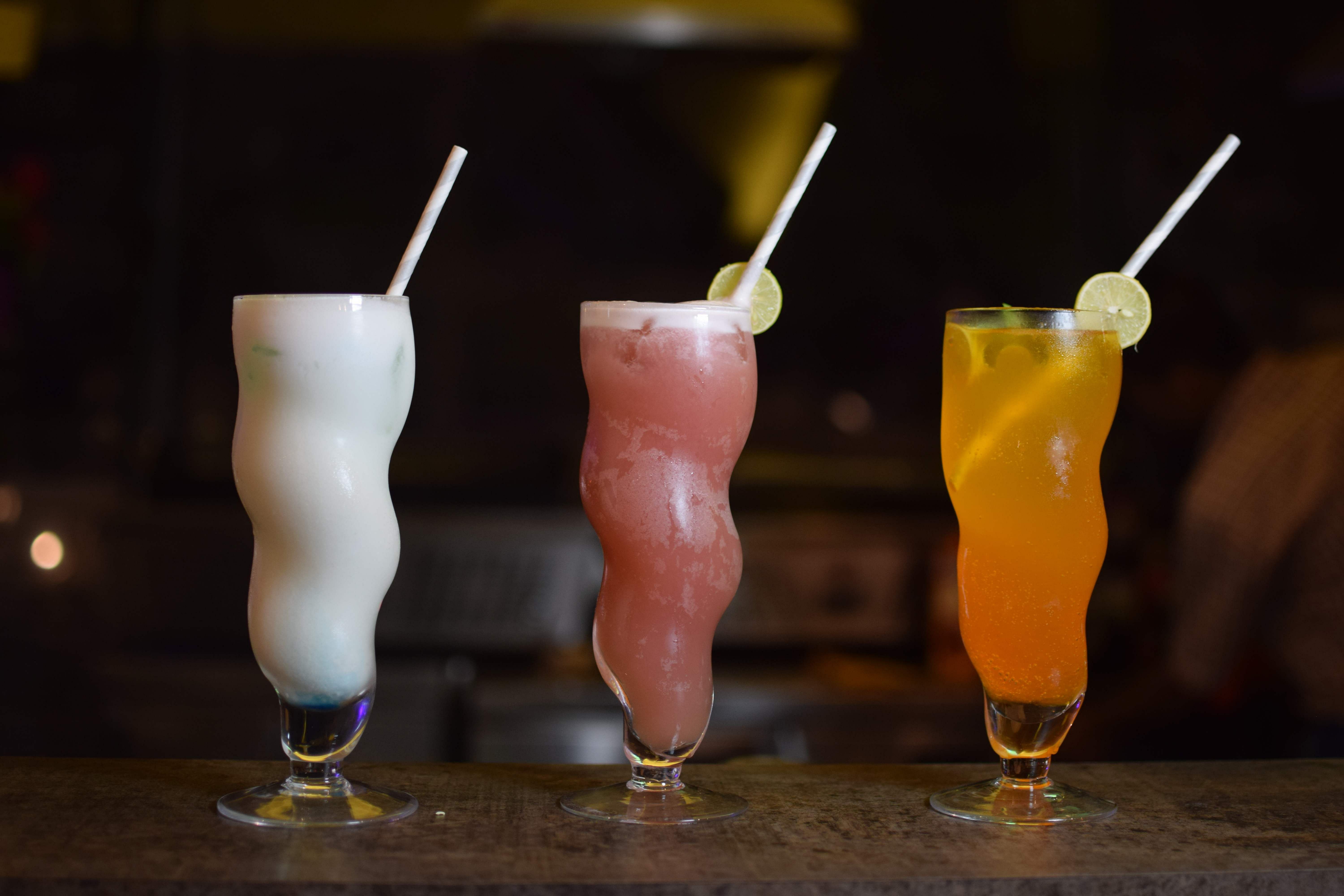 Drink,Rum swizzle,Alcoholic beverage,Non-alcoholic beverage,Distilled beverage,Cocktail,Juice,Bay breeze,Cocktail garnish,Sour