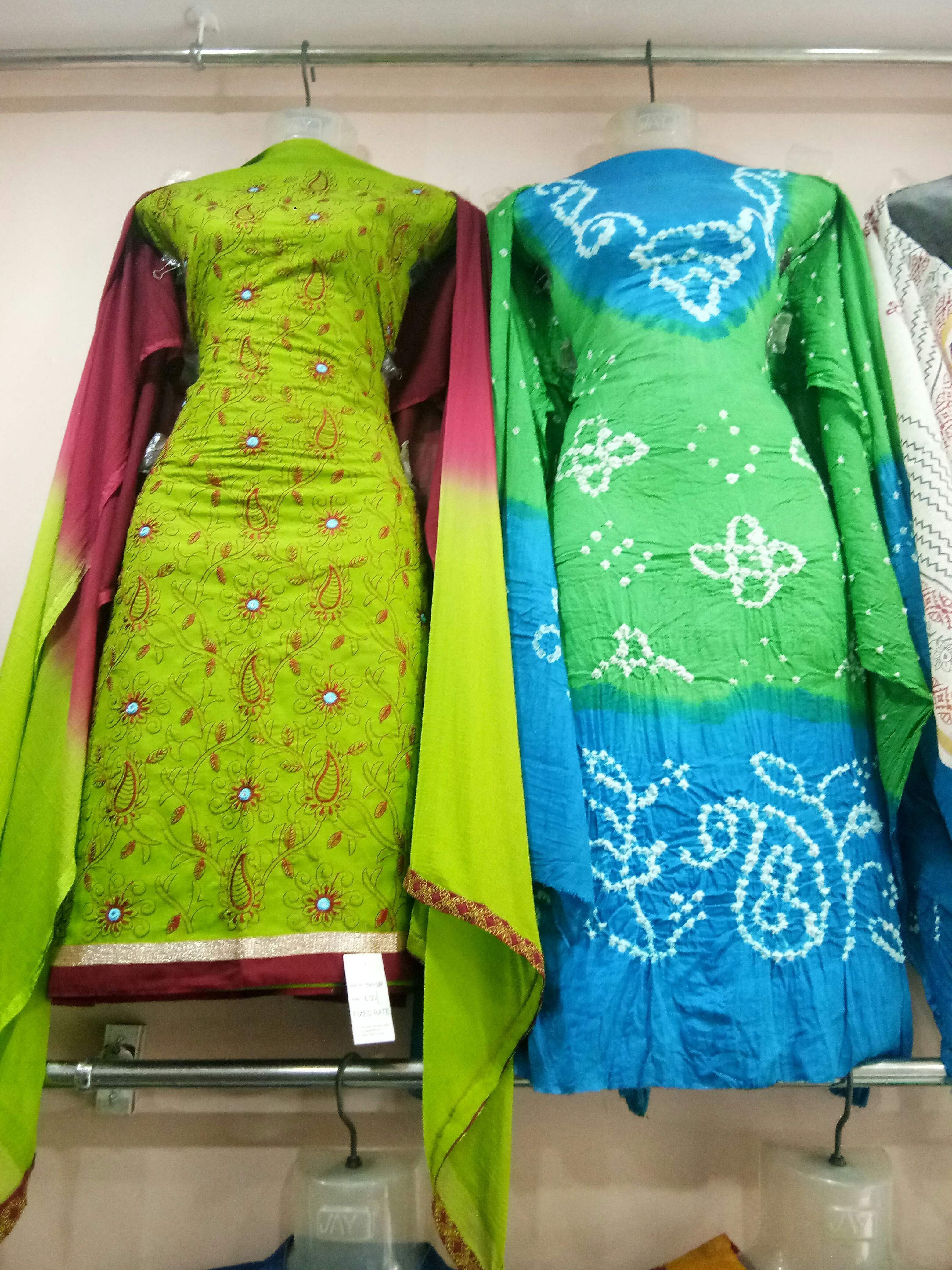 Clothing,Green,Yellow,Outerwear,Textile,Fashion design,Formal wear,Embroidery,Boutique,Dress