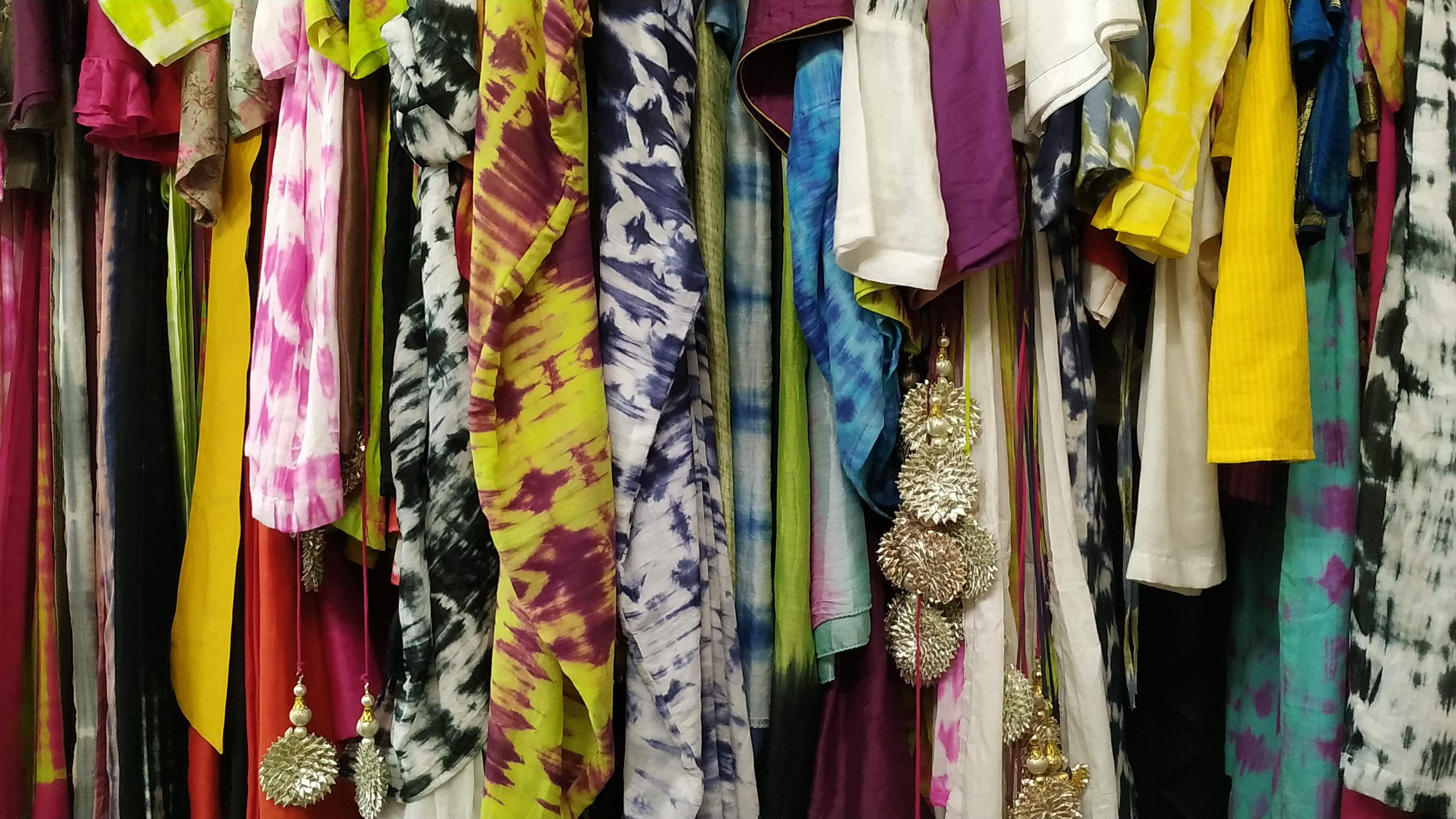 Clothing,Yellow,Room,Textile,Boutique,Closet,Dress,Bazaar,Clothes hanger,Market