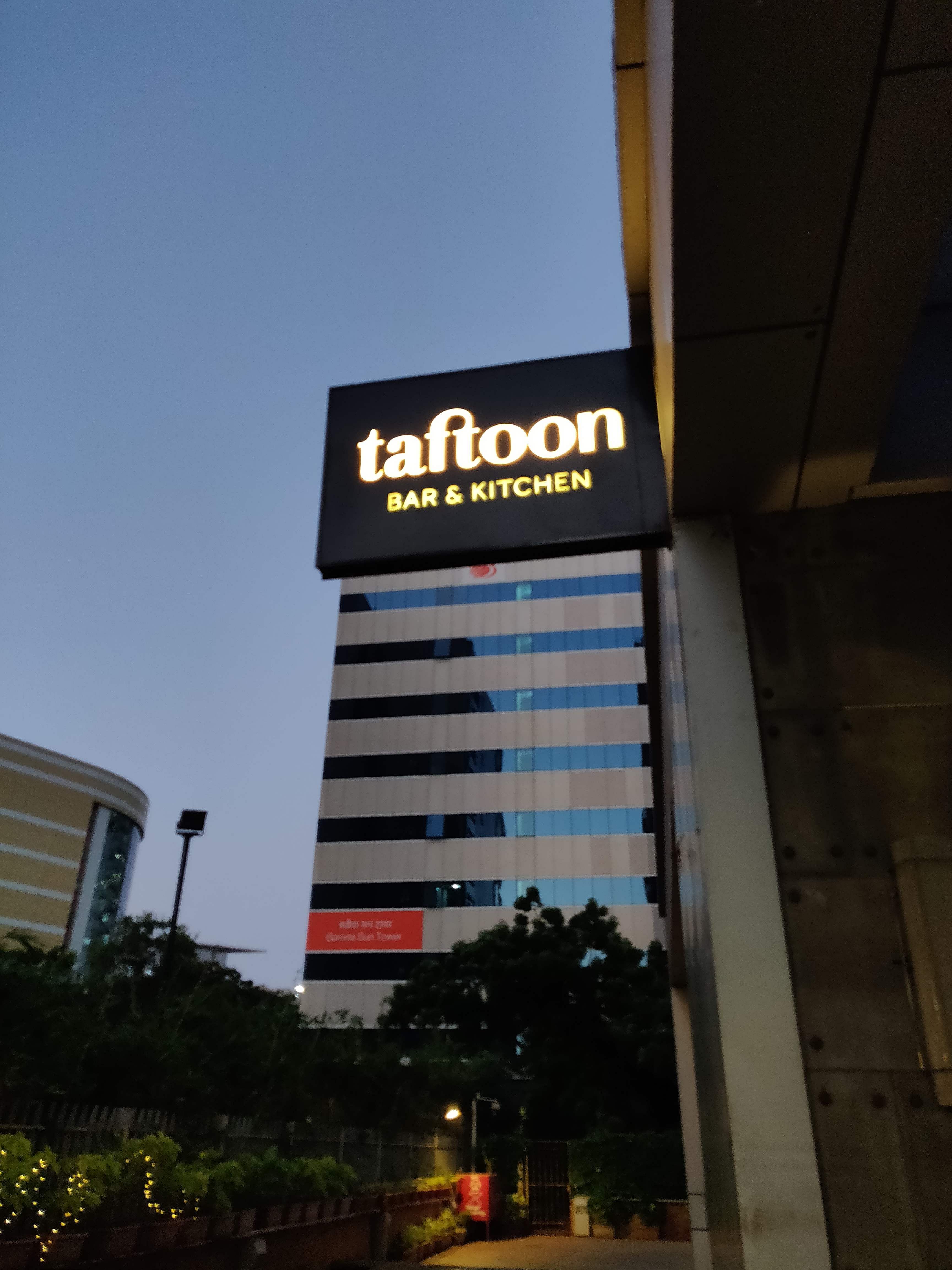 Sky,Building,Architecture,Metropolitan area,City,Signage,Night,Advertising,Hotel,Facade