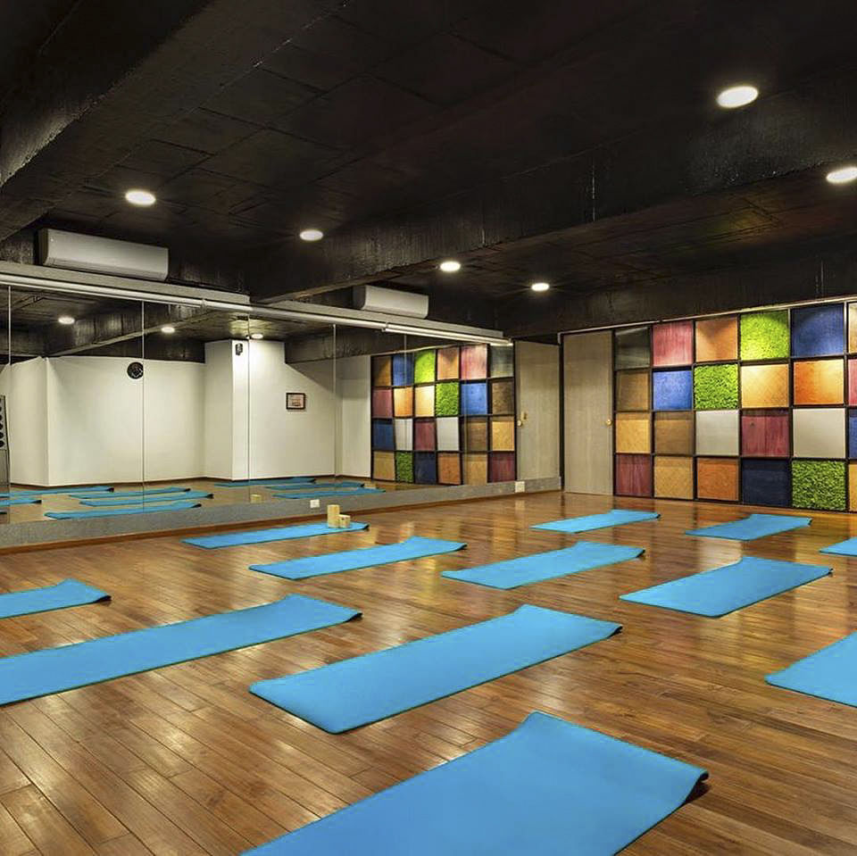 Physical fitness,Floor,Flooring,Interior design,Architecture,Yoga,Room,Building,Ceiling,Hardwood