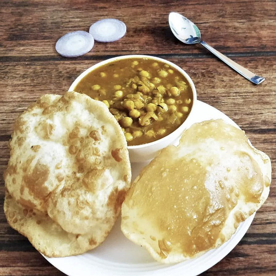 Dish,Food,Cuisine,Ingredient,Chole bhature,Produce,Staple food,Baked goods,Comfort food,Breakfast