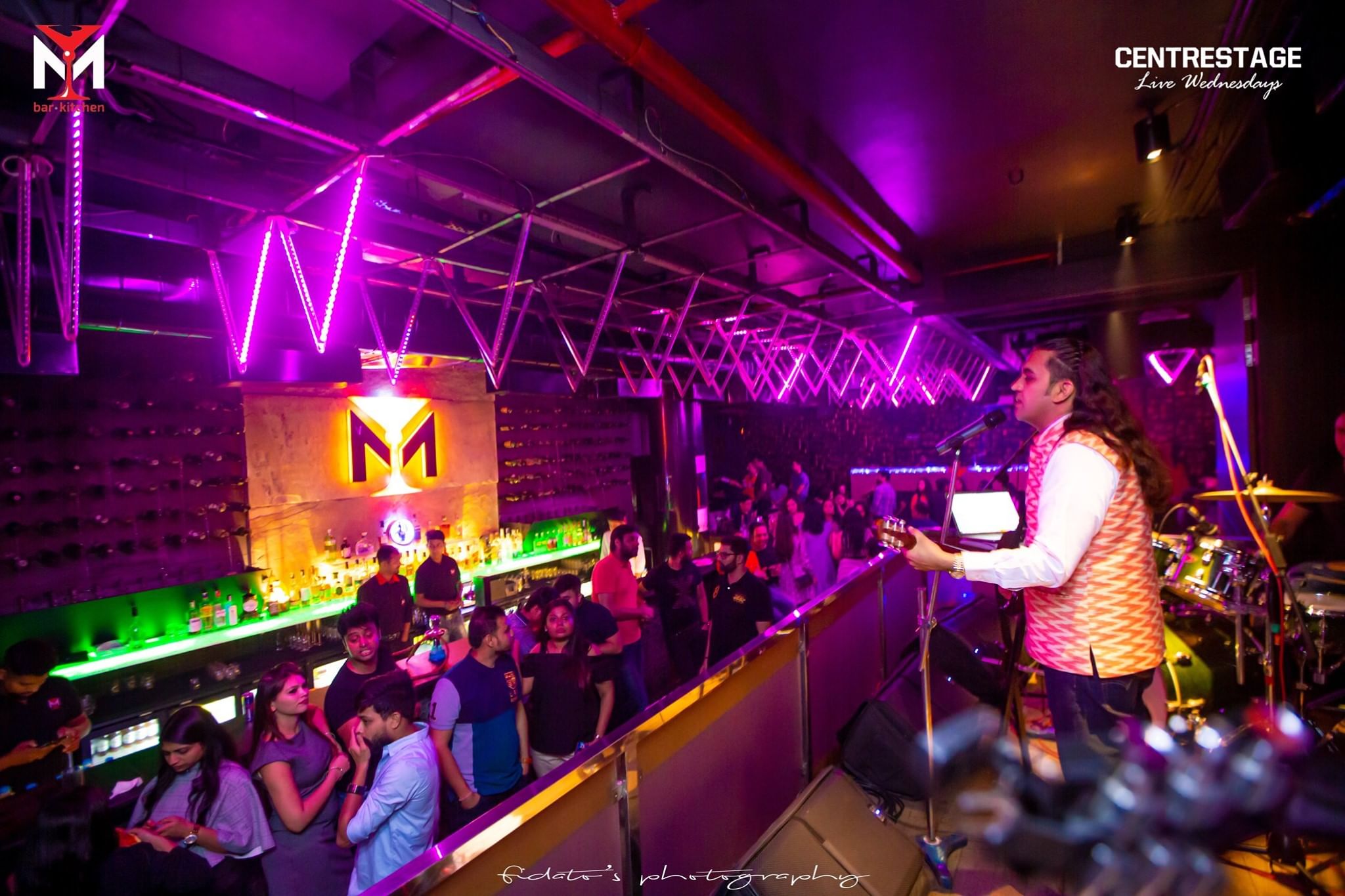 Entertainment,Performance,Nightclub,Music venue,Event,Music,Stage,Purple,Magenta,Performing arts