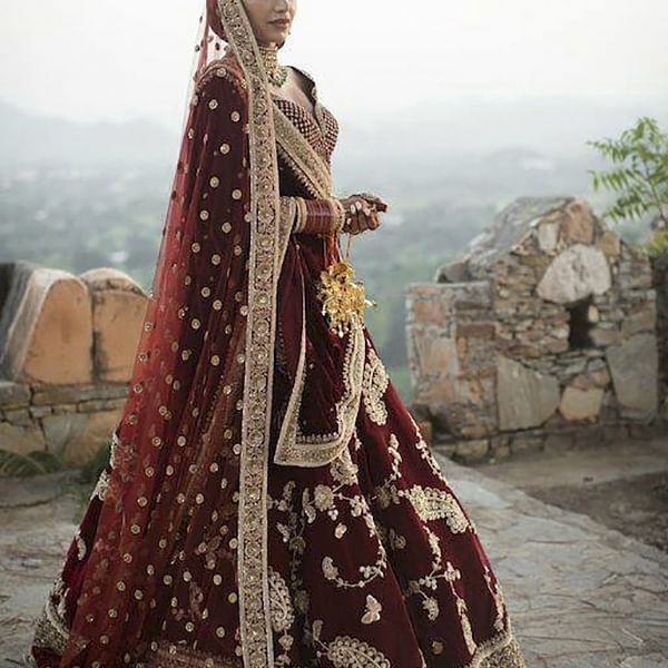 Maroon,Clothing,Sari,Lady,Formal wear,Tradition,Dress,Outerwear,Textile,Photography