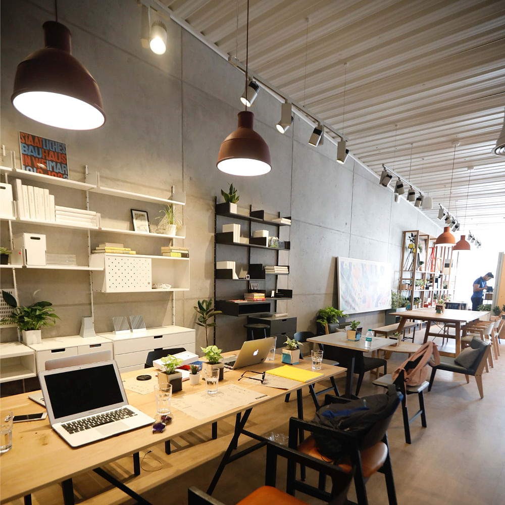 Building,Interior design,Room,Restaurant,Café,Ceiling,Furniture,Table,Coffeehouse,Design