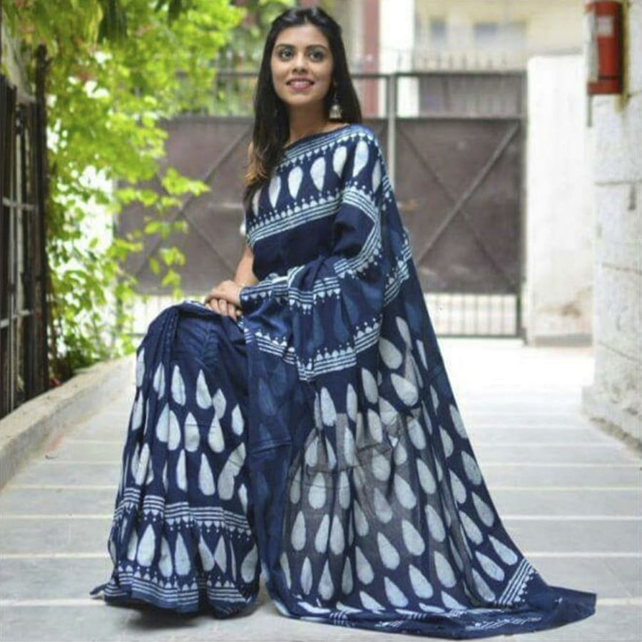 Clothing,White,Blue,Formal wear,Dress,Sari,Fashion model,Fashion,Street fashion,Textile