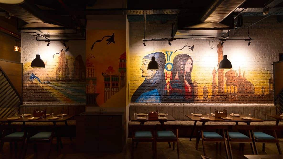 Wall,Architecture,Interior design,Restaurant,Art,Building,Room,Arch,Night,Mural