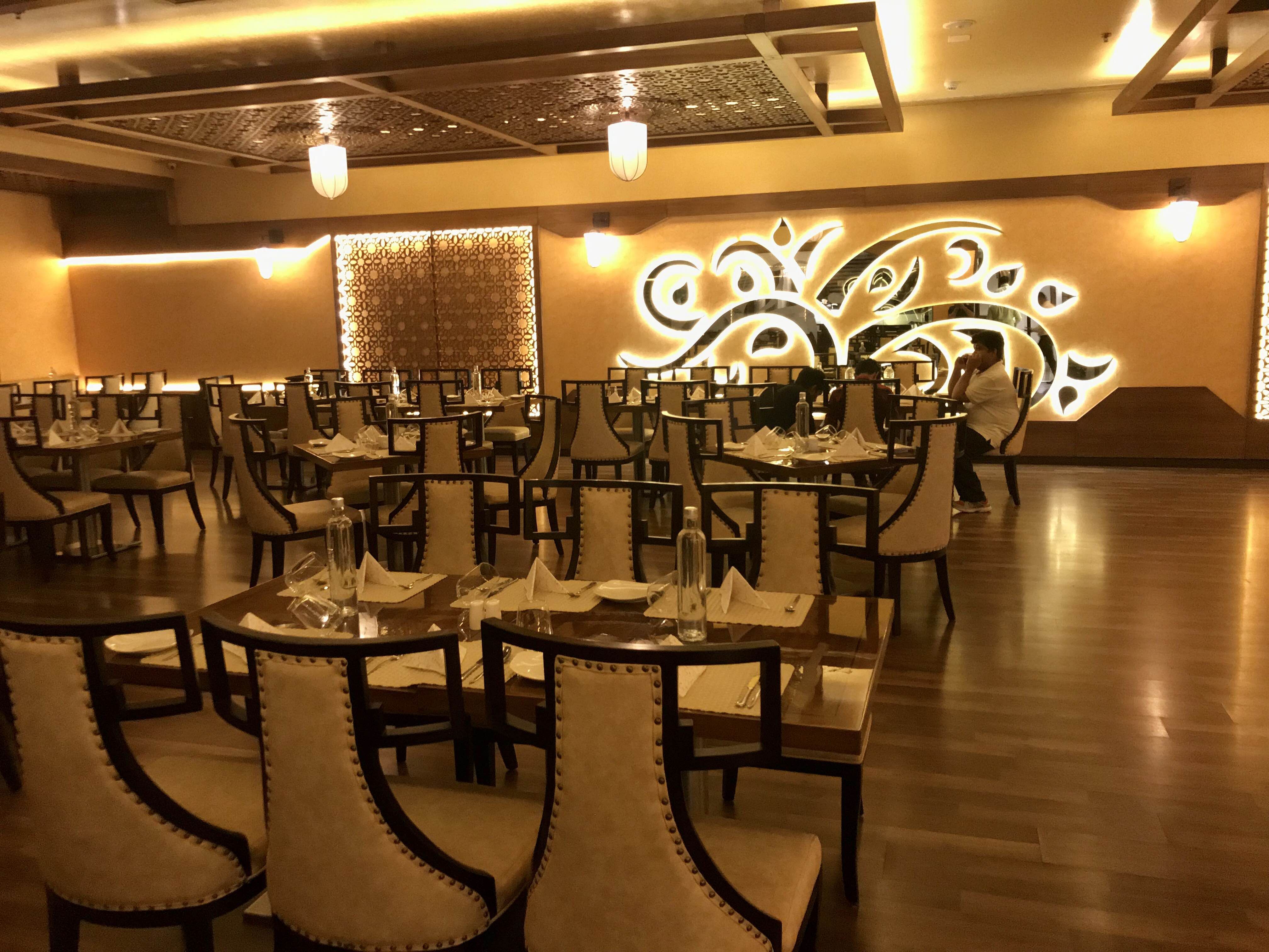 Restaurant,Function hall,Table,Room,Interior design,Building,Dining room,Chair,Kitchen & dining room table,Furniture