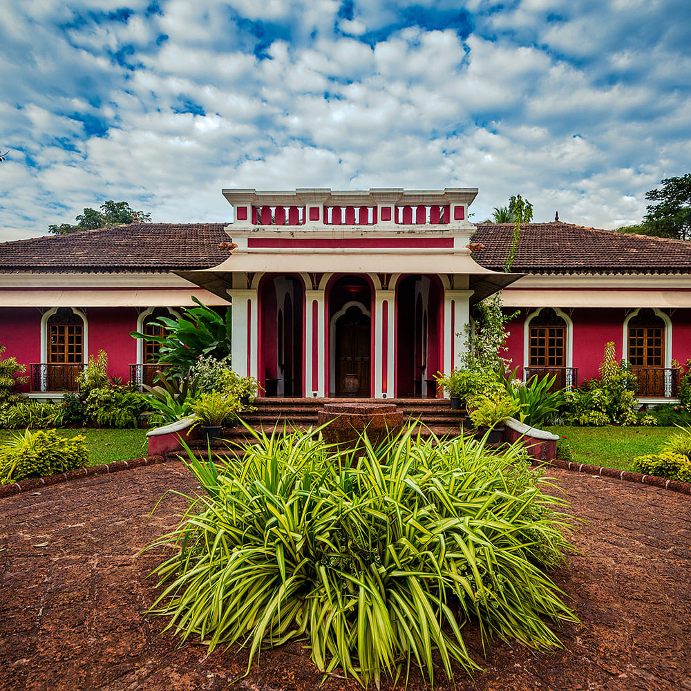 Home,House,Sky,Property,Vegetation,Real estate,Landmark,Building,Architecture,Garden