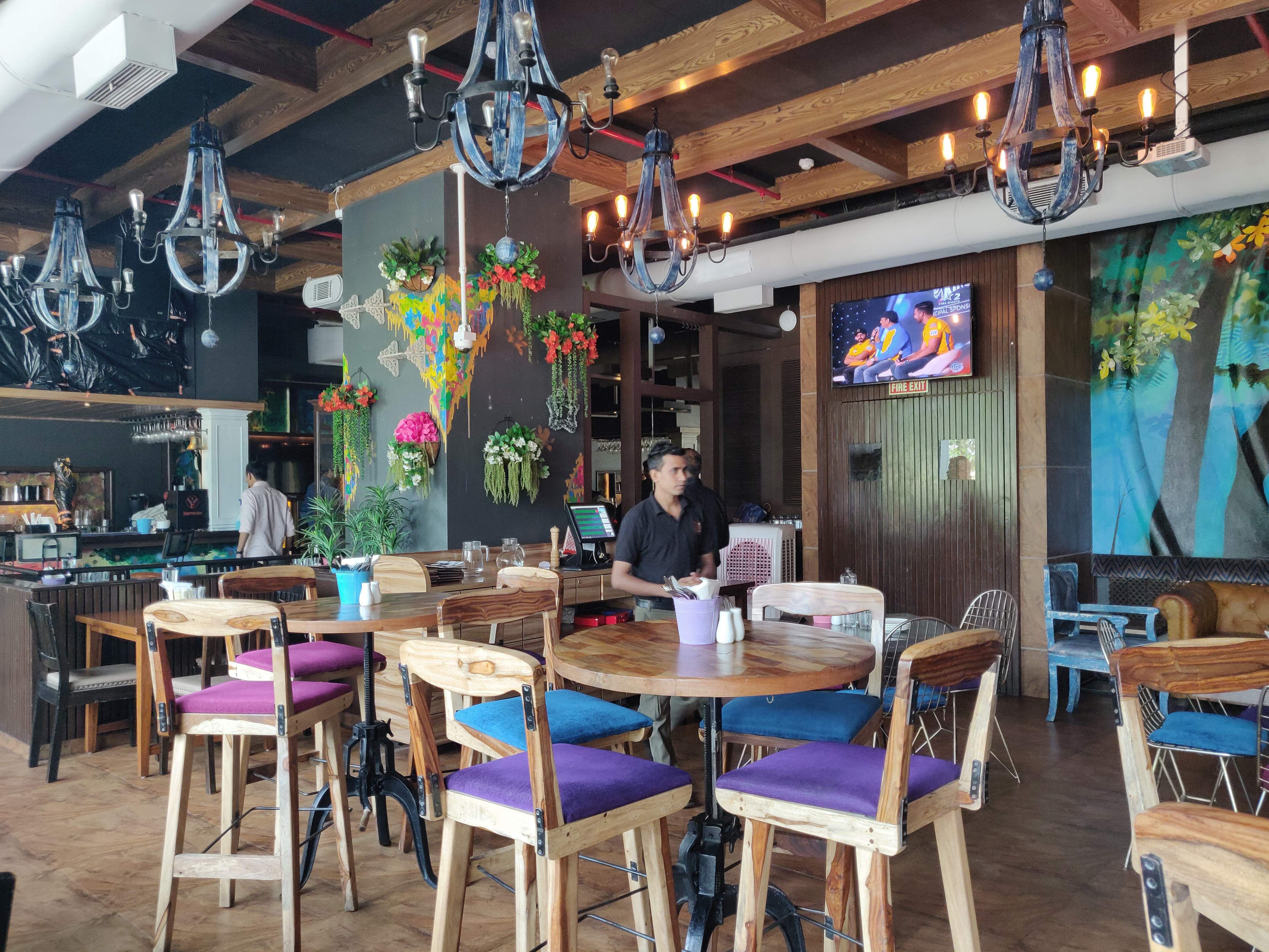 Room,Restaurant,Table,Building,Interior design,Dining room,Furniture,Café,Real estate,Home