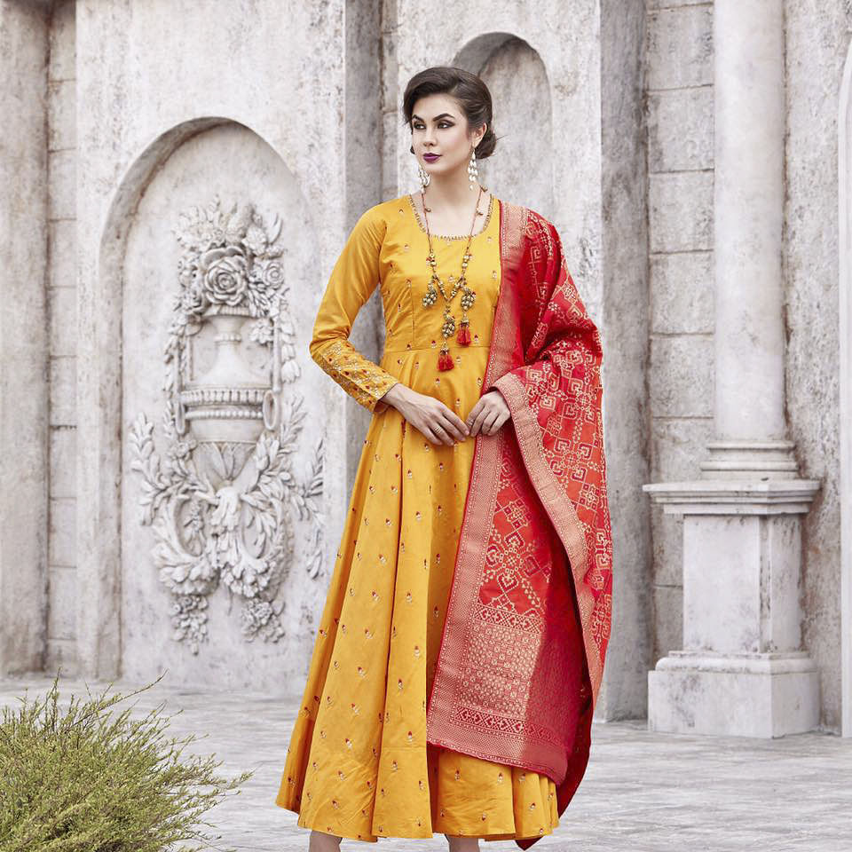 Clothing,Yellow,Orange,Formal wear,Dress,Maroon,Tradition,Embroidery,Fashion,Suit