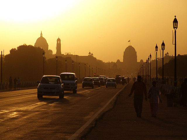 Atmospheric phenomenon,Morning,Landmark,Sky,Evening,Mode of transport,Sunset,Dusk,Haze,Sunrise