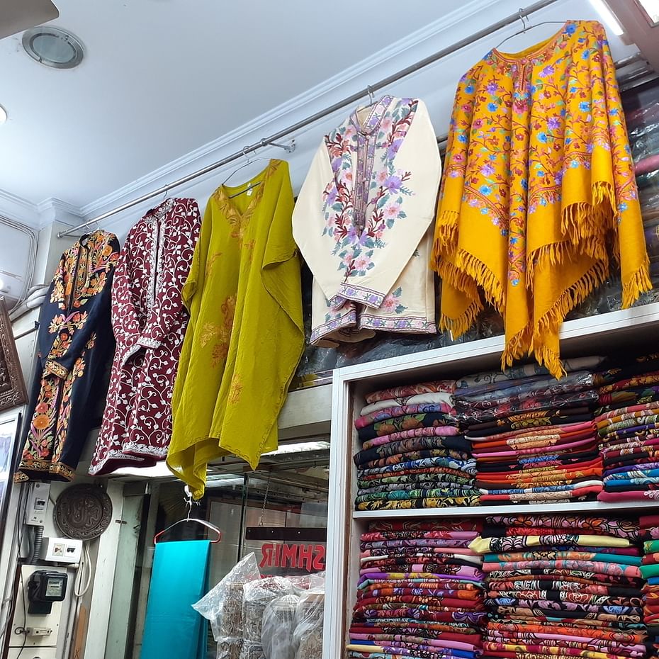 Yellow,Textile,Outlet store,Building,Bazaar,Room,Architecture,Boutique,Market,City