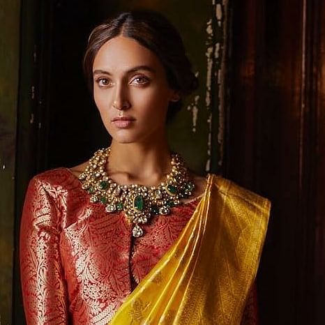 Clothing,Maroon,Beauty,Yellow,Neck,Jewellery,Fashion,Formal wear,Necklace,Textile