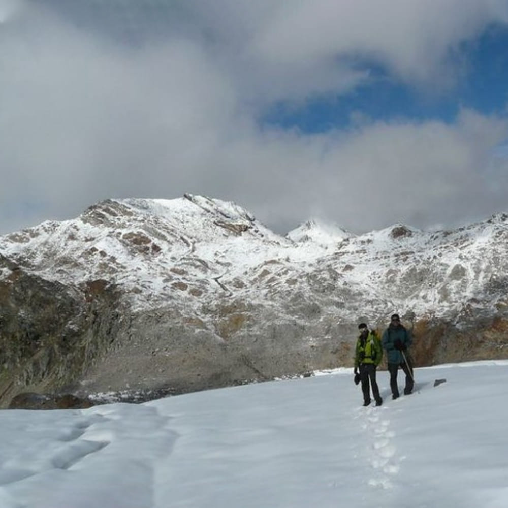 Snow,Mountainous landforms,Mountain,Winter,Geological phenomenon,Sky,Mountain range,Glacial landform,Mountaineering,Freezing