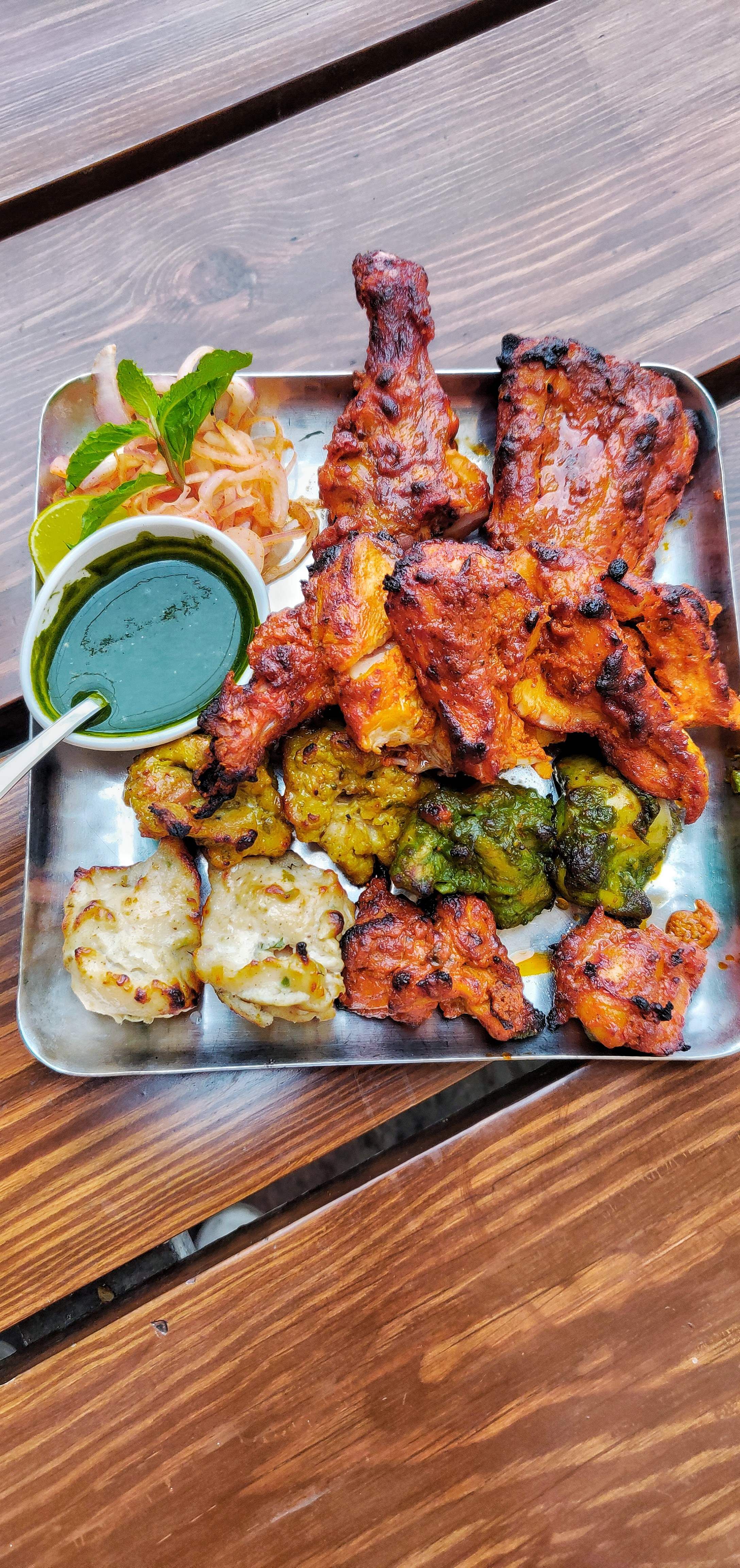 Dish,Cuisine,Food,Meat,Ingredient,Tandoori chicken,Fried food,Chicken meat,Chicken tikka,Shashlik