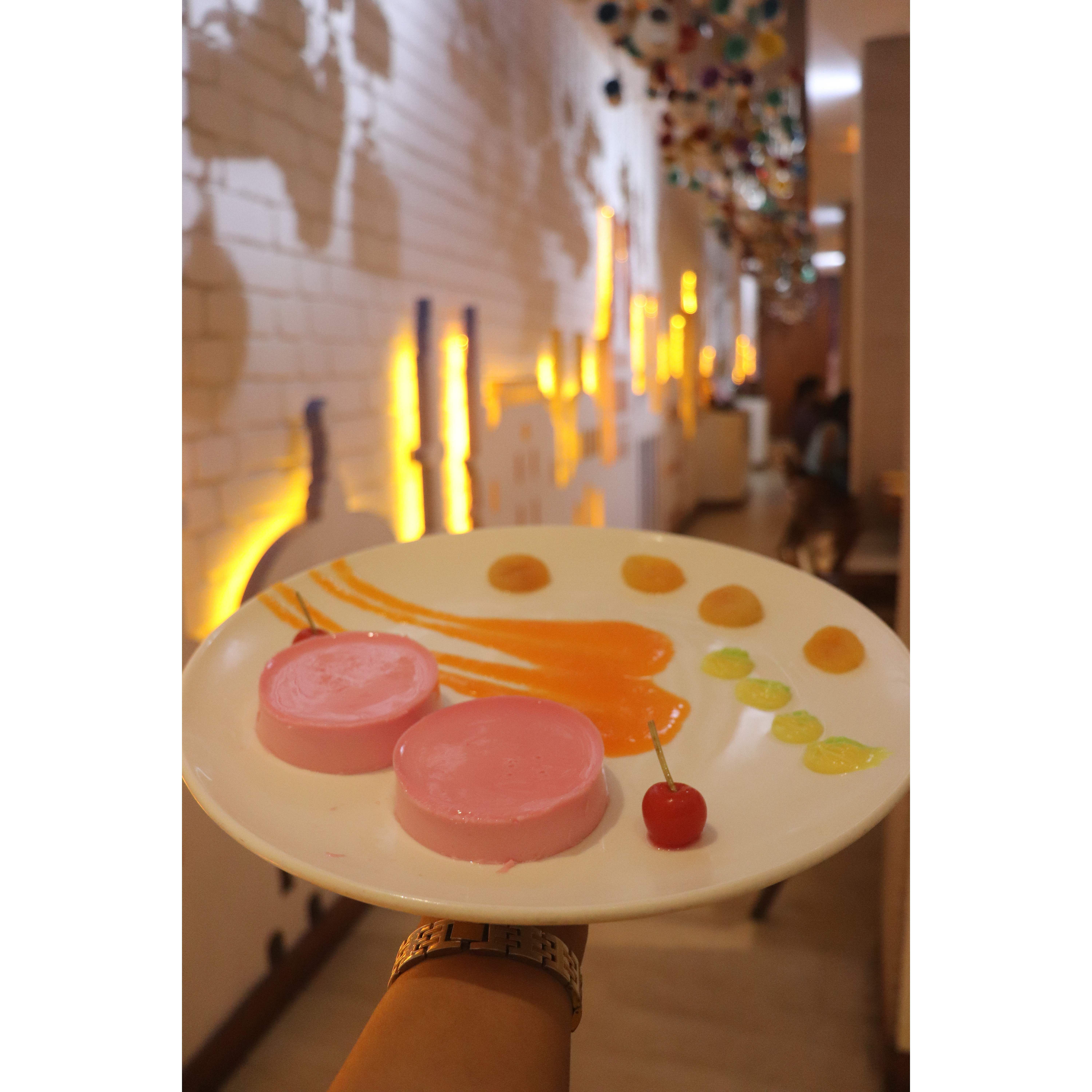 Orange,Lighting,Candle,Material property,Table,Interior design,Candle holder,Circle,Still life