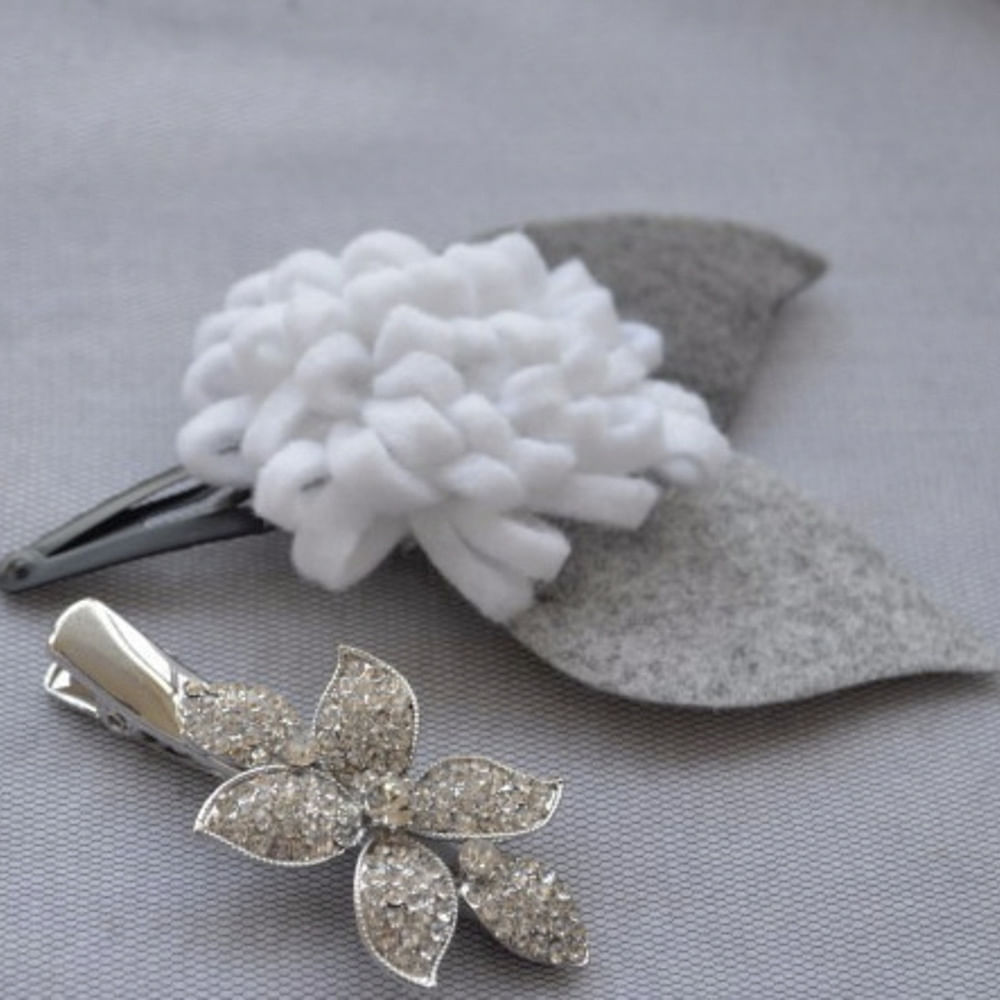 Leaf,Fashion accessory,Petal,Jewellery,Brooch,Flower,Hair accessory,Plant,Hydrangea