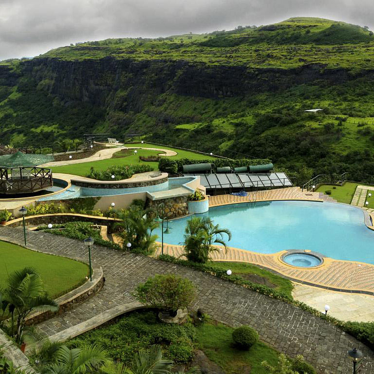 Swimming pool,Resort,Natural landscape,Property,Leisure,Landscape,Hill station,Vacation,Real estate,Grass